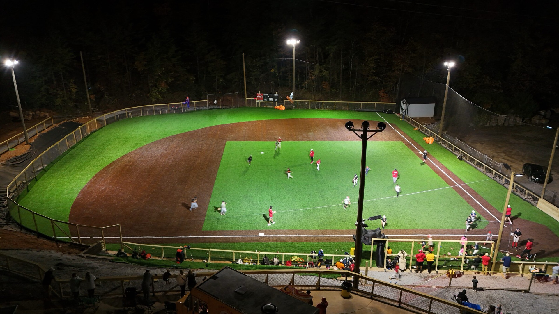 Comp Park turf field under the lights at night